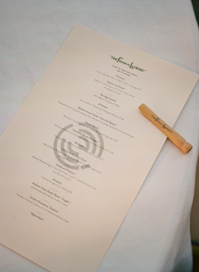 The Chef's Tasting Menu for August 7, 2026, pinned with a wooden clothespin