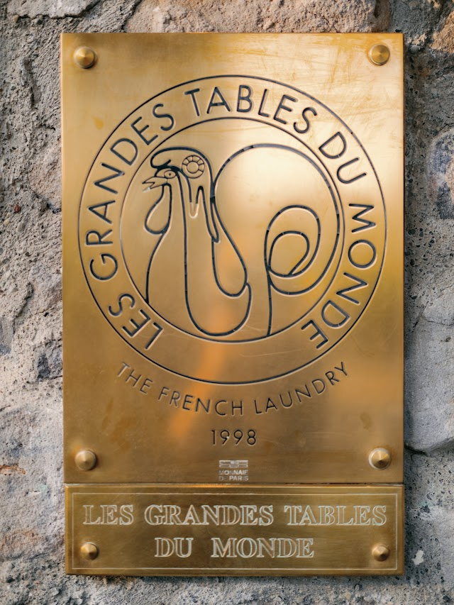 Les Grandes Tables du Monde brass plaque