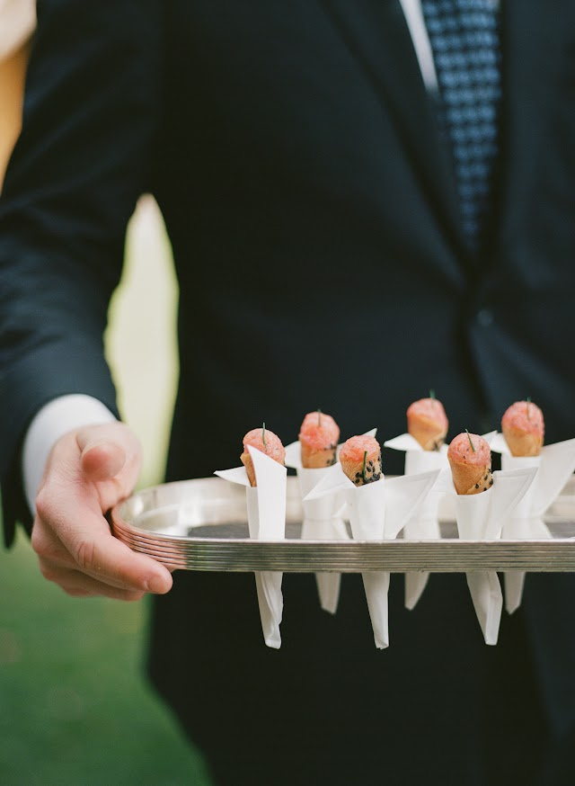 A silver tray of salmon cornets