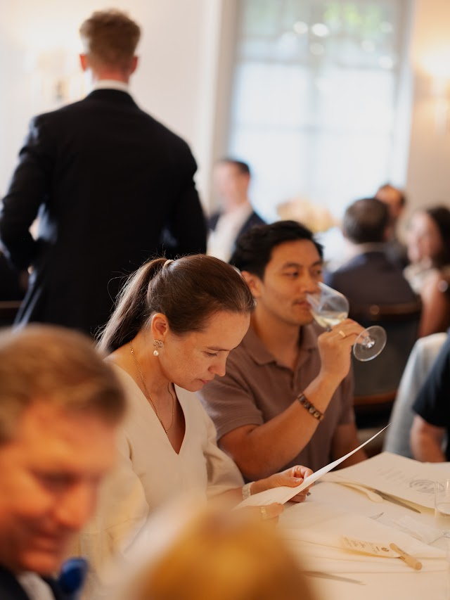 Reading the menu as dinner begins